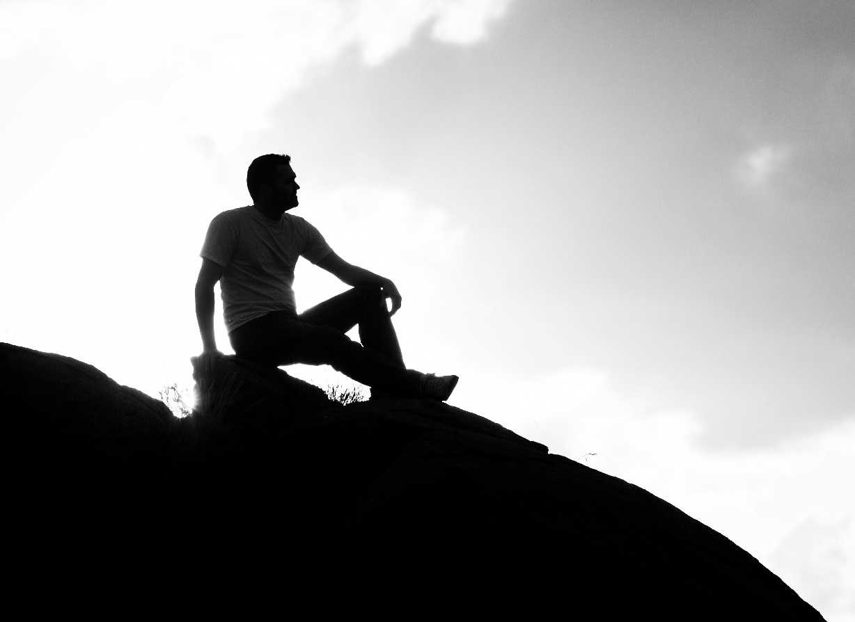 Man on Rock Thinking