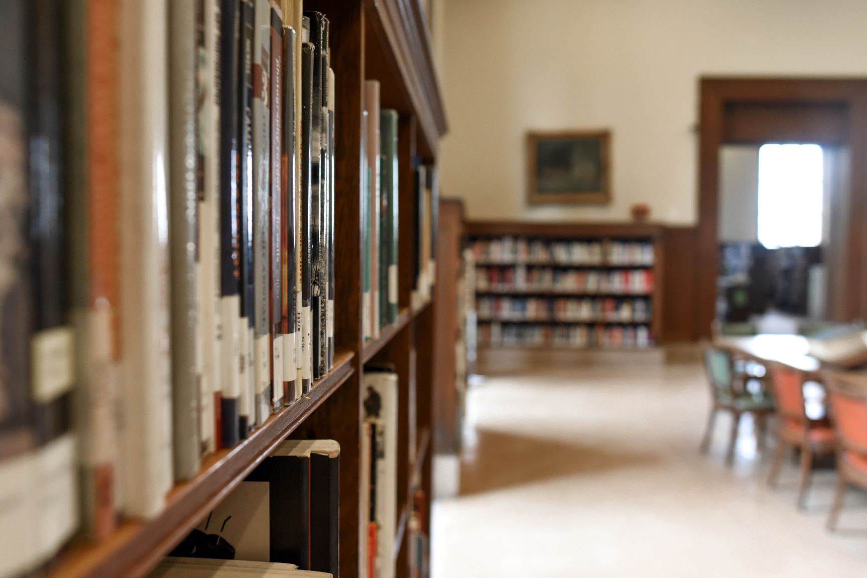 selective focus photography of bookshelf